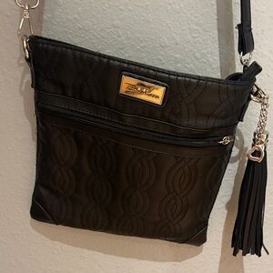 Chic Black Crossbody Bag with Tassel by Rosetti